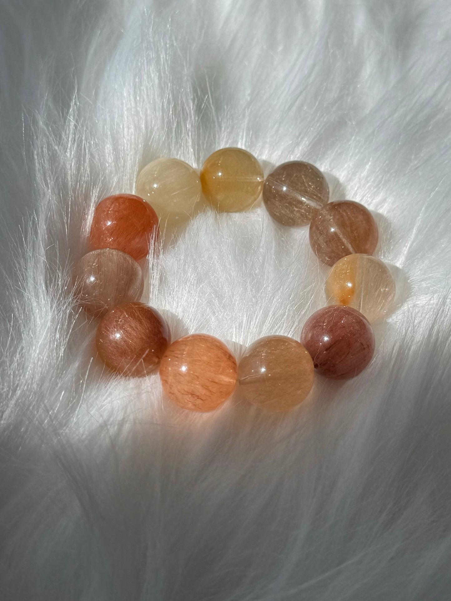 售出欣赏 金桔柠檬兔毛Rutilated Quartz(15mm)